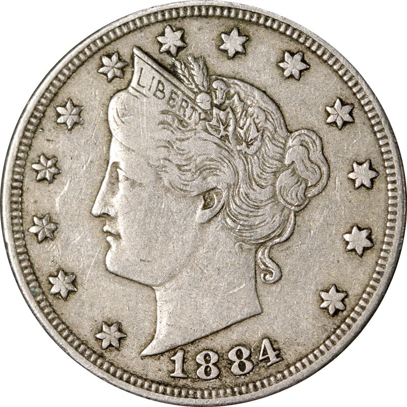 1884 United States Liberty V Nickel Coin Circulated: 1884 United States Liberty V Nickel Coin Circulated This is an 1884 Liberty V Nickel from the United States. The coin is circulated and composed of nickel. It is uncertified and is in pre-owned condit