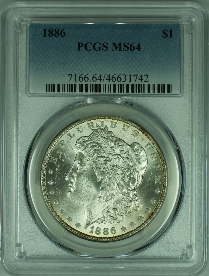 PCGS MS-64 Graded 1886 Philadelphia Morgan Silver Dollar: PCGS MS-64 Graded 1886 Philadelphia Morgan Silver Dollar This 1886 Morgan Silver Dollar is certified by PCGS with a grade of MS-64. Struck at the Philadelphia Mint, the coin is composed of 90% silver 