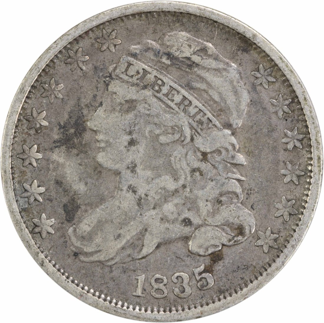 1835 Capped Bust Silver Dime 10C Uncertified Philadelphia: 1835 Capped Bust Silver Dime 10C Uncertified Philadelphia This 1835 Capped Bust Silver Dime is a remarkable piece of numismatic history. It features a design by John Reich and is composed of 89.2% sil