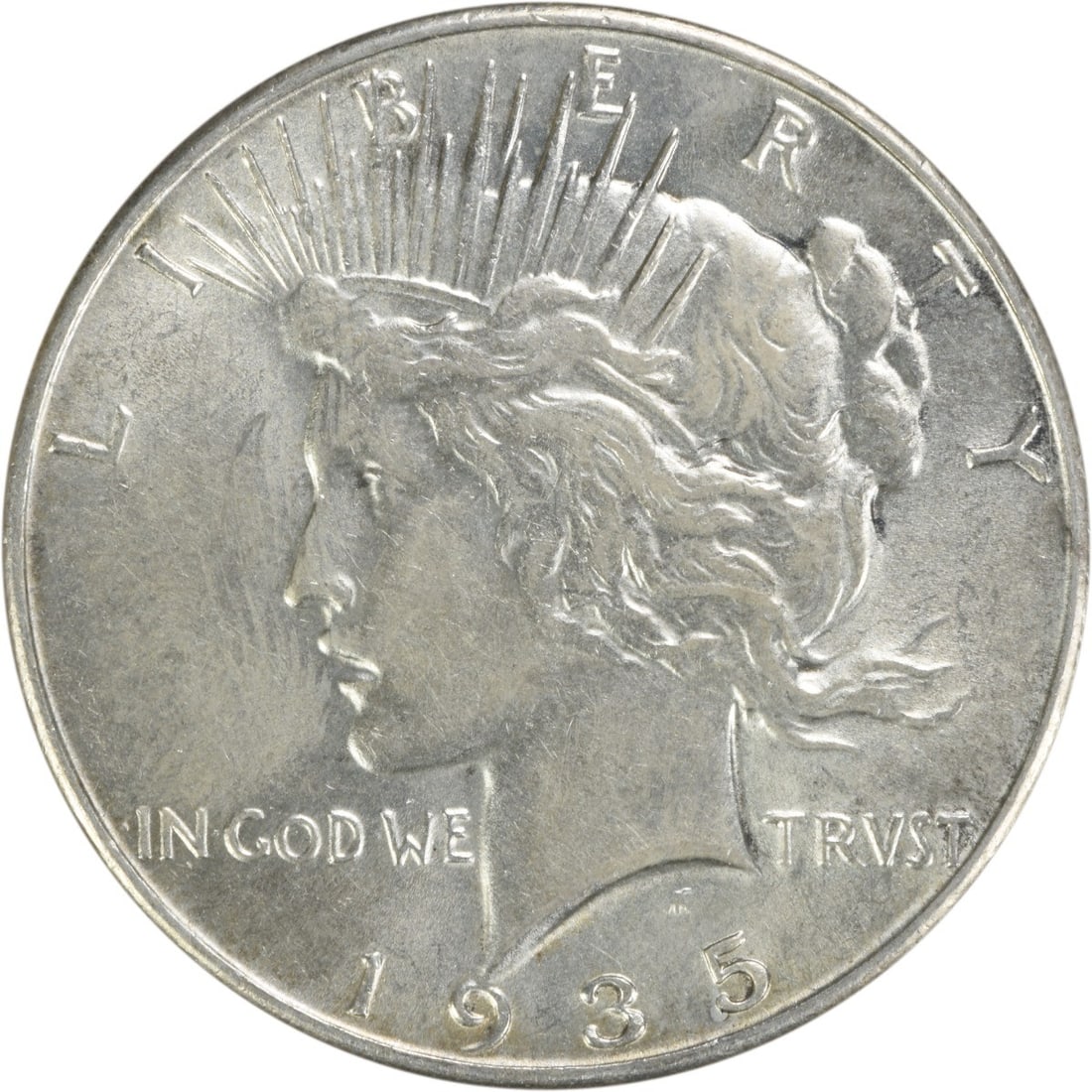 1935 Peace Silver Dollar AU Uncertified Philadelphia Mint: 1935 Peace Silver Dollar AU Uncertified Philadelphia Mint This 1935 Peace Silver Dollar is a remarkable piece of history, featuring a stunning design by Anthony de Francisci. The coin is from the Phil