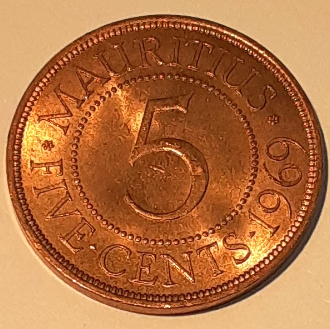 Roll of 20 Uncirculated 1969 Mauritius Bronze 5 Cents Queen Elizabeth II Coins: Roll of 20 Uncirculated 1969 Mauritius Bronze 5 Cents Queen Elizabeth II Coins This roll includes 20 uncirculated 1969 Mauritius 5 Cents bronze coins featuring the bust of Queen Elizabeth II on the ob