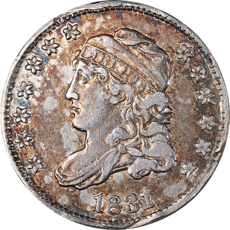 1831 Silver Bust Half Dime United States Circulated with Rim Damage: 1831 Silver Bust Half Dime United States Circulated with Rim Damage This 1831 Bust Half Dime from the United States is a circulated, pre-owned coin composed of silver. It features rim bumps, reflectin