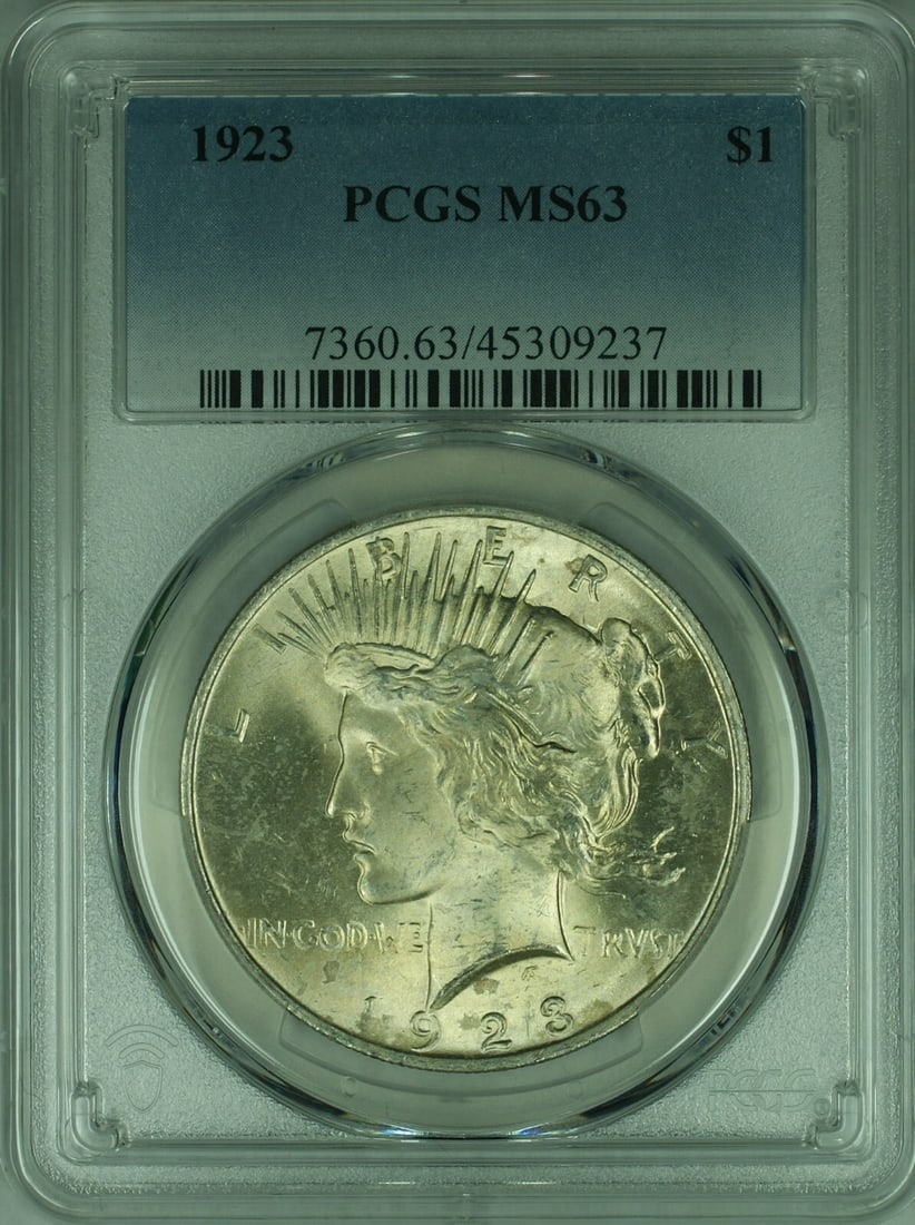 1923 Peace Dollar Silver Coin PCGS Certified MS 63 Uncirculated: 1923 Peace Dollar Silver Coin PCGS Certified MS 63 Uncirculated This 1923 Peace Silver Dollar is certified by PCGS with a grade of MS-63. Minted in Philadelphia, it is composed of silver and remains u
