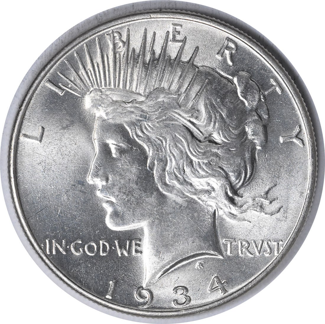 1934 Peace Silver Dollar Choice BU Uncertified KM 150: 1934 Peace Silver Dollar Choice BU Uncertified KM 150 This 1934 Peace Silver Dollar is a stunning example of American coinage, featuring a striking design that symbolizes peace. It is in Choice Brilli