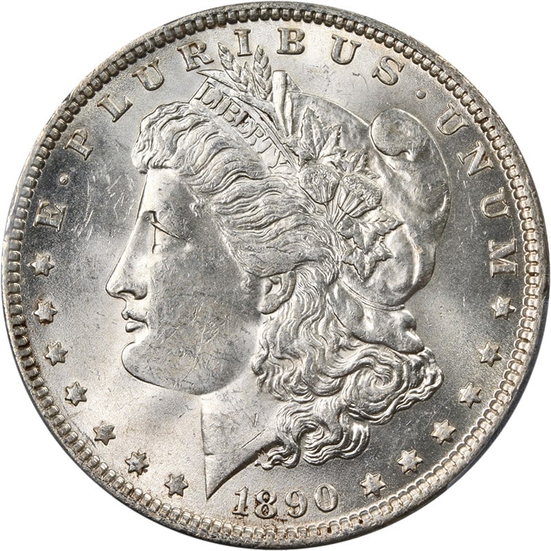 PCGS MS63 1890 Morgan Dollar Philadelphia Mint Silver Coin: PCGS MS63 1890 Morgan Dollar Philadelphia Mint Silver Coin This 1890-P Morgan Silver Dollar is graded PCGS MS63 and features nice eye appeal with attractive luster and a bright white appearance. It ha