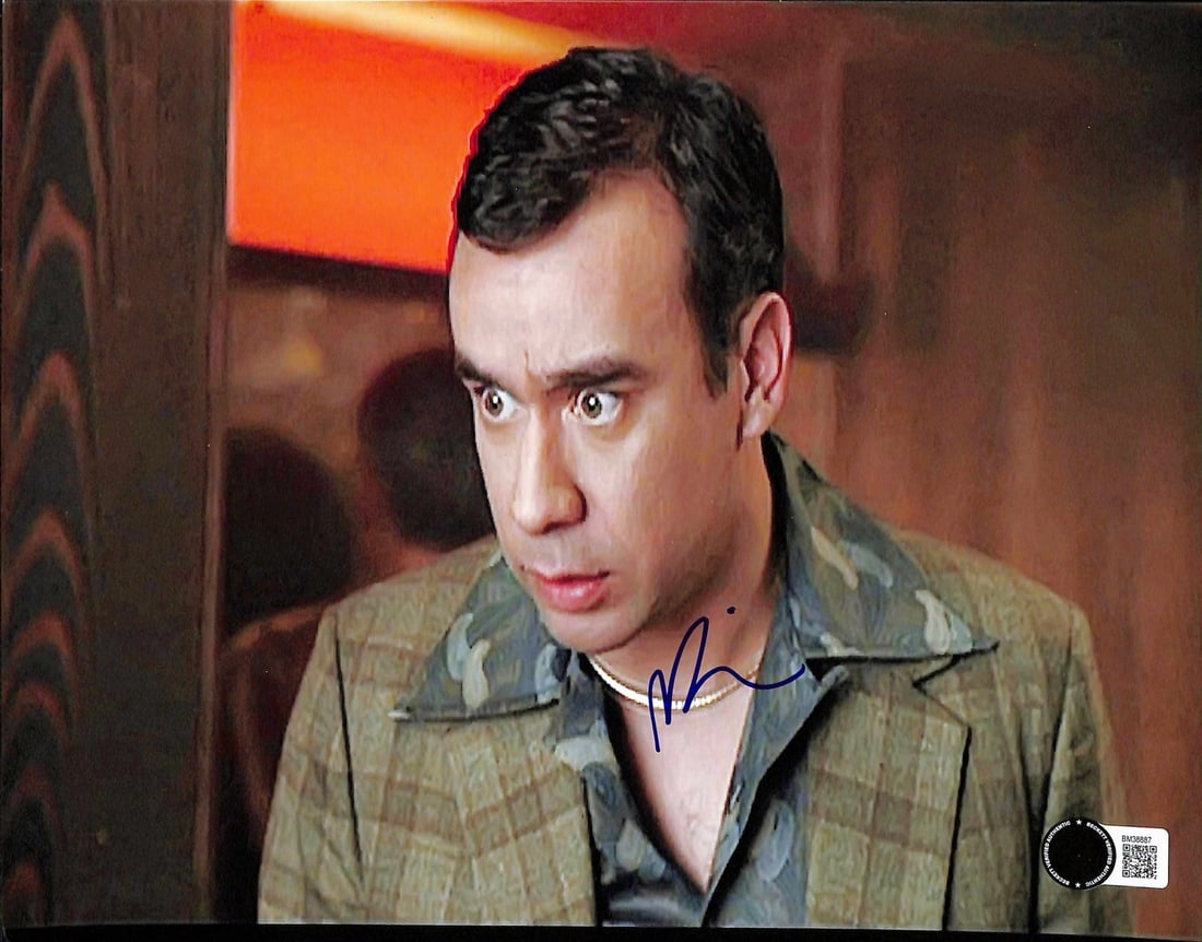 Fred Armisen Signed Anchorman 8x10 Photo Beckett Certified: Fred Armisen Signed Anchorman 8x10 Photo Beckett Certified This autographed 8x10 photograph features Fred Armisen, known for his role as "Tino" in the movie Anchorman. The signature is rendered in blu