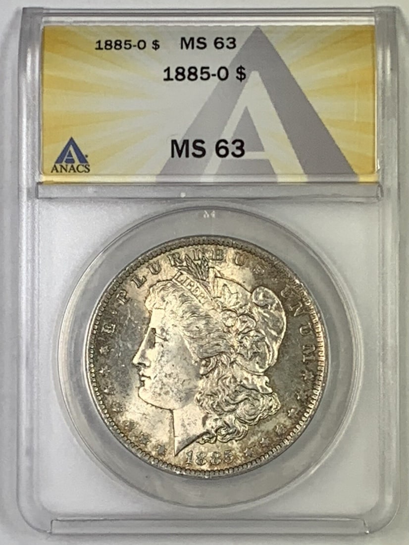 ANACS MS-63 1885-O Morgan Dollar New Orleans Mint Silver Coin Light Toning: ANACS MS-63 1885-O Morgan Dollar New Orleans Mint Silver Coin Light Toning This is an 1885-O Morgan Silver Dollar with a denomination of $1, minted in New Orleans. The coin is composed of silver and h