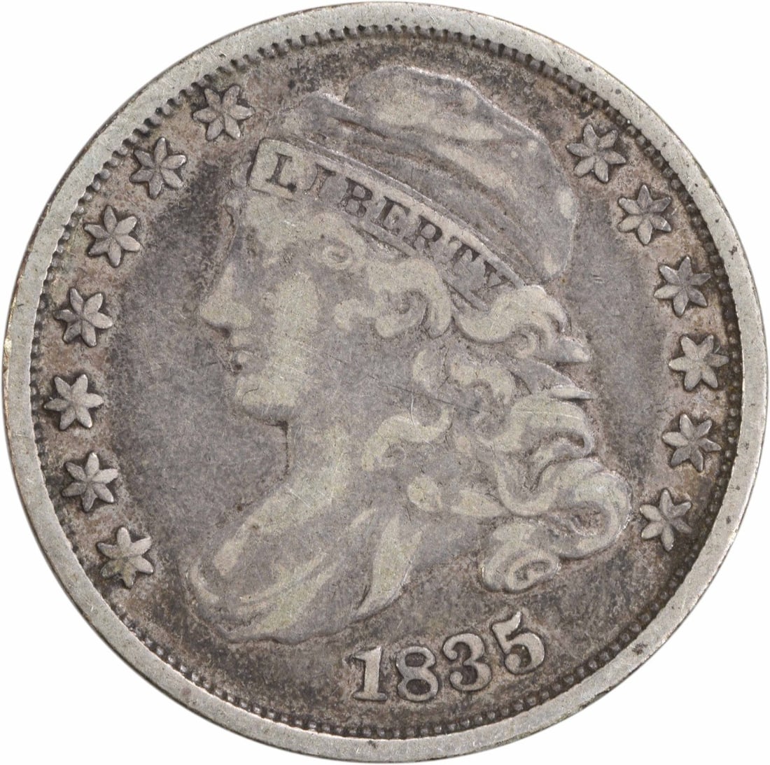 1835 Capped Bust Silver Dime 10C Philadelphia Mint Uncertified: 1835 Capped Bust Silver Dime 10C Philadelphia Mint Uncertified This 1835 Capped Bust Silver Dime is a classic American coin that showcases the artistry of designer John Reich. The coin has a grade of 