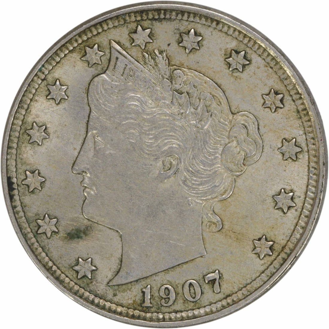 1907 Liberty Nickel AU Circulated Uncertified 5C Philadelphia: 1907 Liberty Nickel AU Circulated Uncertified 5C Philadelphia This 1907 Liberty Nickel is a beautifully preserved coin from the United States, showcasing the craftsmanship of designer Charles E. Barbe
