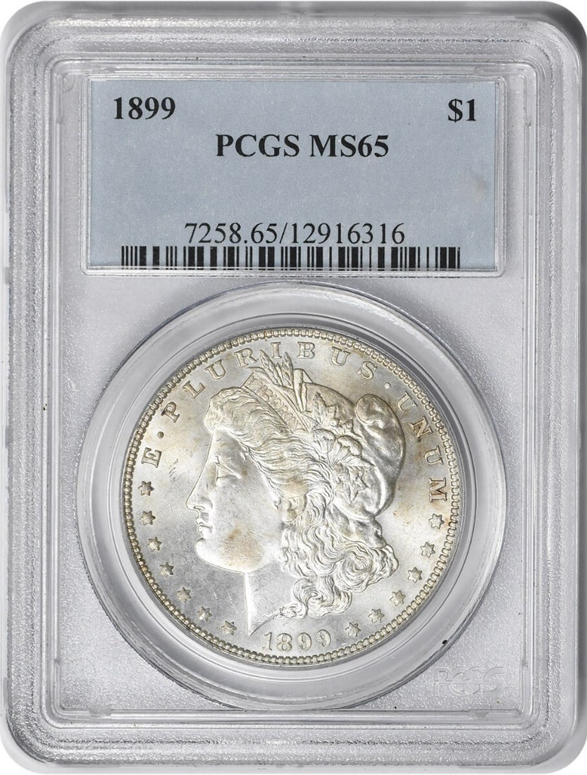 1899 Morgan Silver Dollar MS65 Uncirculated PCGS Certified: 1899 Morgan Silver Dollar MS65 Uncirculated PCGS Certified This stunning 1899 Morgan Silver Dollar, graded MS65 by PCGS, showcases the exceptional craftsmanship of its time. With a composition of 90% 