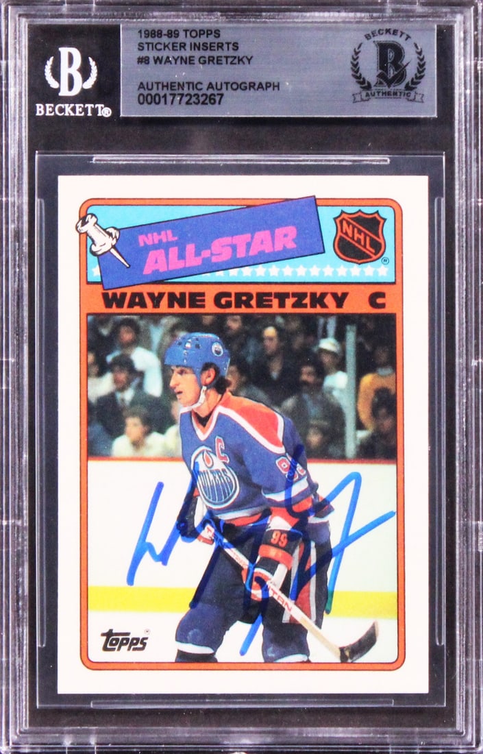 Wayne Gretzky Autographed 1987 Topps Sticker #8 Beckett Authenticated Slabbed Card: Wayne Gretzky Autographed 1987 Topps Sticker #8 Beckett Authenticated Slabbed Card This 1987 Topps Sticker Inserts #8 card features the autograph of Wayne Gretzky from the Edmonton Oilers. The card is