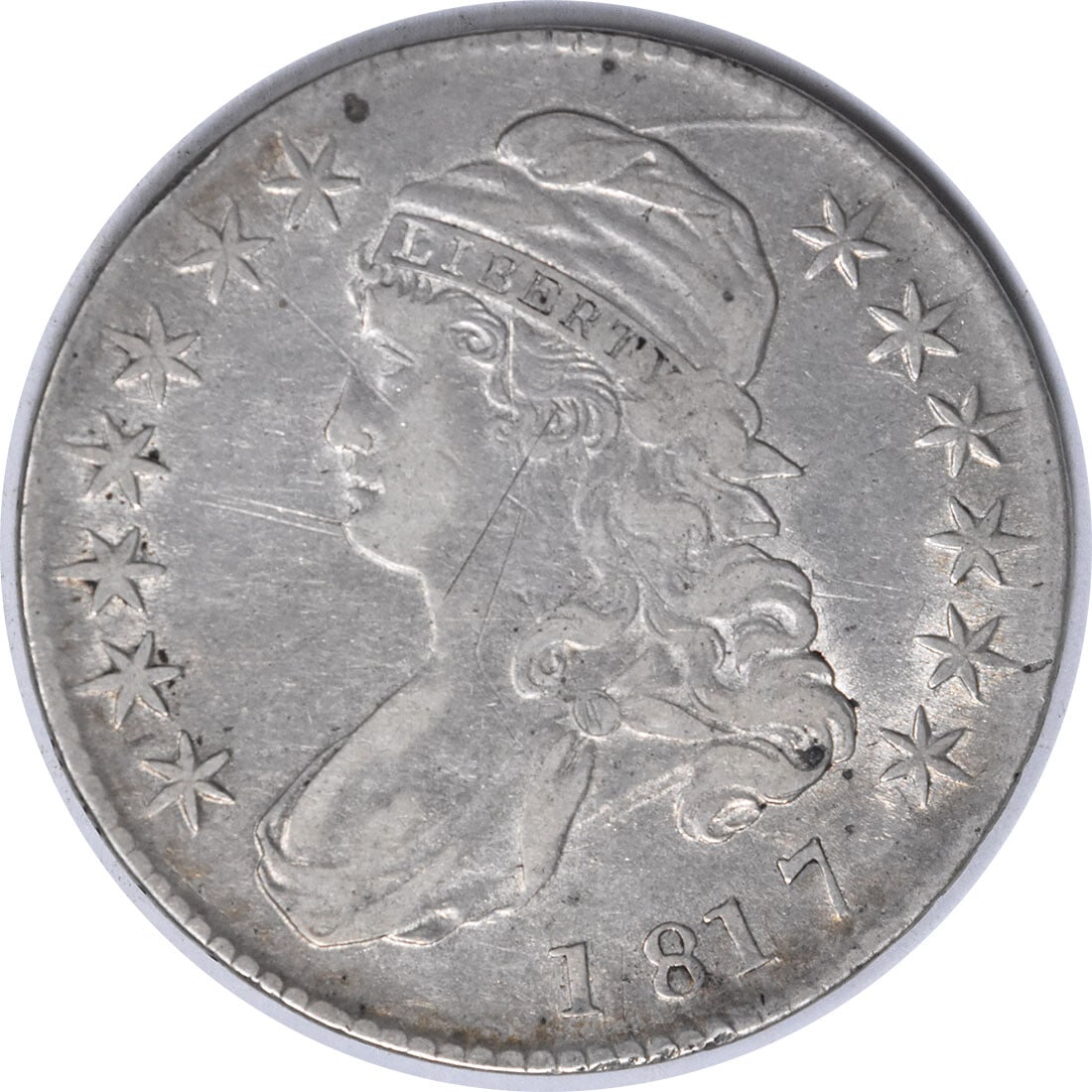 1817 O-106A Bust Silver Half Dollar 50C by John Reich: 1817 O-106A Bust Silver Half Dollar 50C by John Reich This 1817 Bust Silver Half Dollar showcases a stunning design by John Reich, representing a significant piece of American numismatic history. It i
