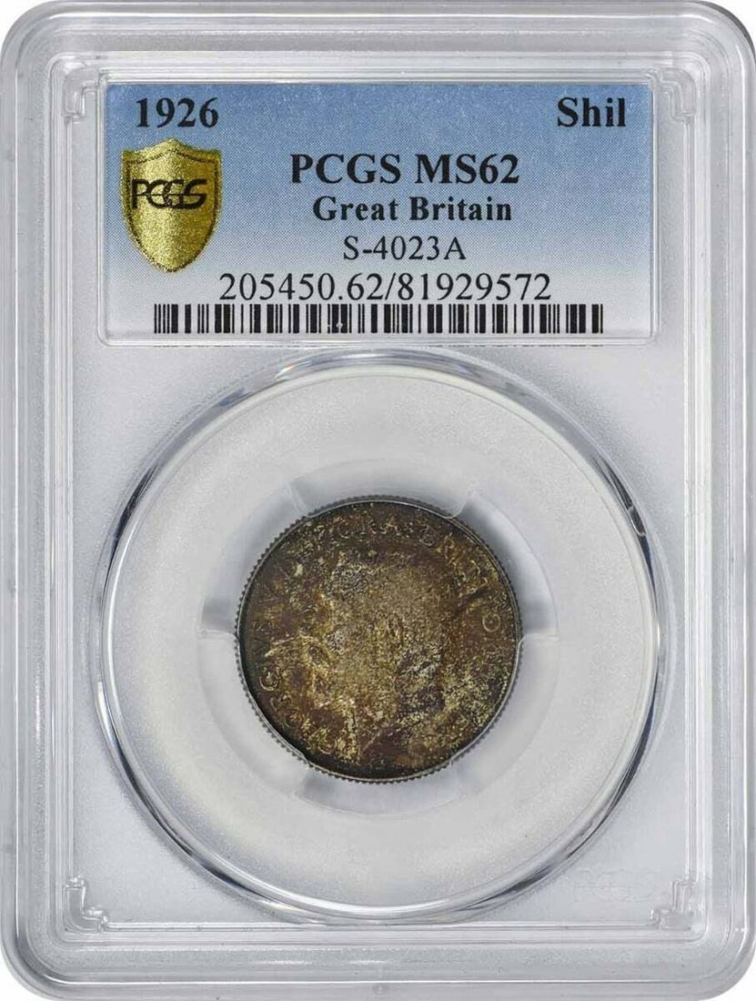 PCGS MS62 United Kingdom 1926 Shilling Uncirculated Coin: PCGS MS62 United Kingdom 1926 Shilling Uncirculated Coin This is a 1926 Great Britain shilling graded MS62 by PCGS. The coin is uncirculated and originates from the United Kingdom. It is in pre-owned 