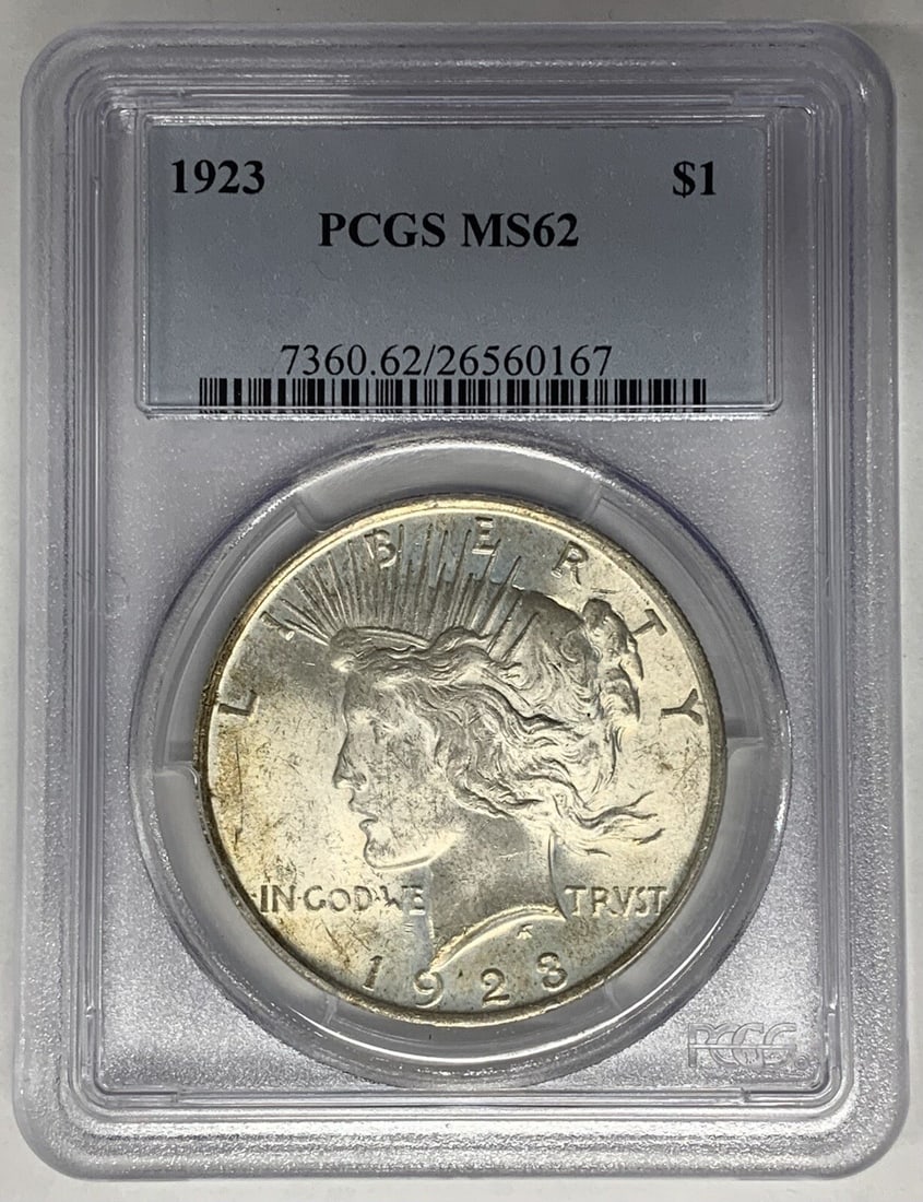 PCGS MS 62 Peace Dollar Silver Coin 1923 Certified United States: PCGS MS 62 Peace Dollar Silver Coin 1923 Certified United States This is a 1923 Peace Silver Dollar coin from the United States, graded MS 62 by PCGS. The coin is uncirculated and made of silver. It i