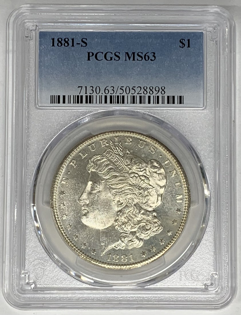 PCGS MS 63 1881-S Silver Morgan Dollar Proof-Like Uncirculated Coin: PCGS MS 63 1881-S Silver Morgan Dollar Proof-Like Uncirculated Coin This is an 1881-S Morgan Silver Dollar with a proof-like obverse, graded MS 63 by PCGS. The coin is uncirculated and composed of sil