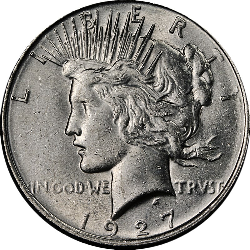 Uncirculated 1927 D Silver Peace Dollar with Lustrous Finish: Uncirculated 1927 D Silver Peace Dollar with Lustrous Finish This 1927-D Peace Dollar is an uncirculated silver coin from the United States. It features bright white color, attractive luster, and a we
