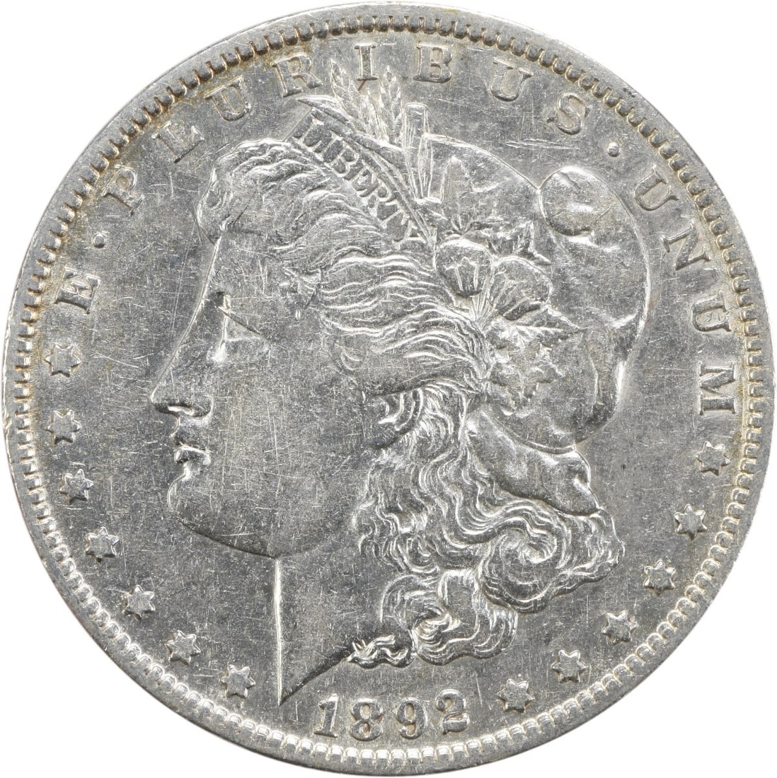 1892 New Orleans Morgan Dollar 90 Percent Silver EF Uncertified: 1892 New Orleans Morgan Dollar 90 Percent Silver EF Uncertified This 1892-O Morgan Silver Dollar is an uncertified, circulated coin minted in New Orleans. Struck from a composition of 90% silver and 1