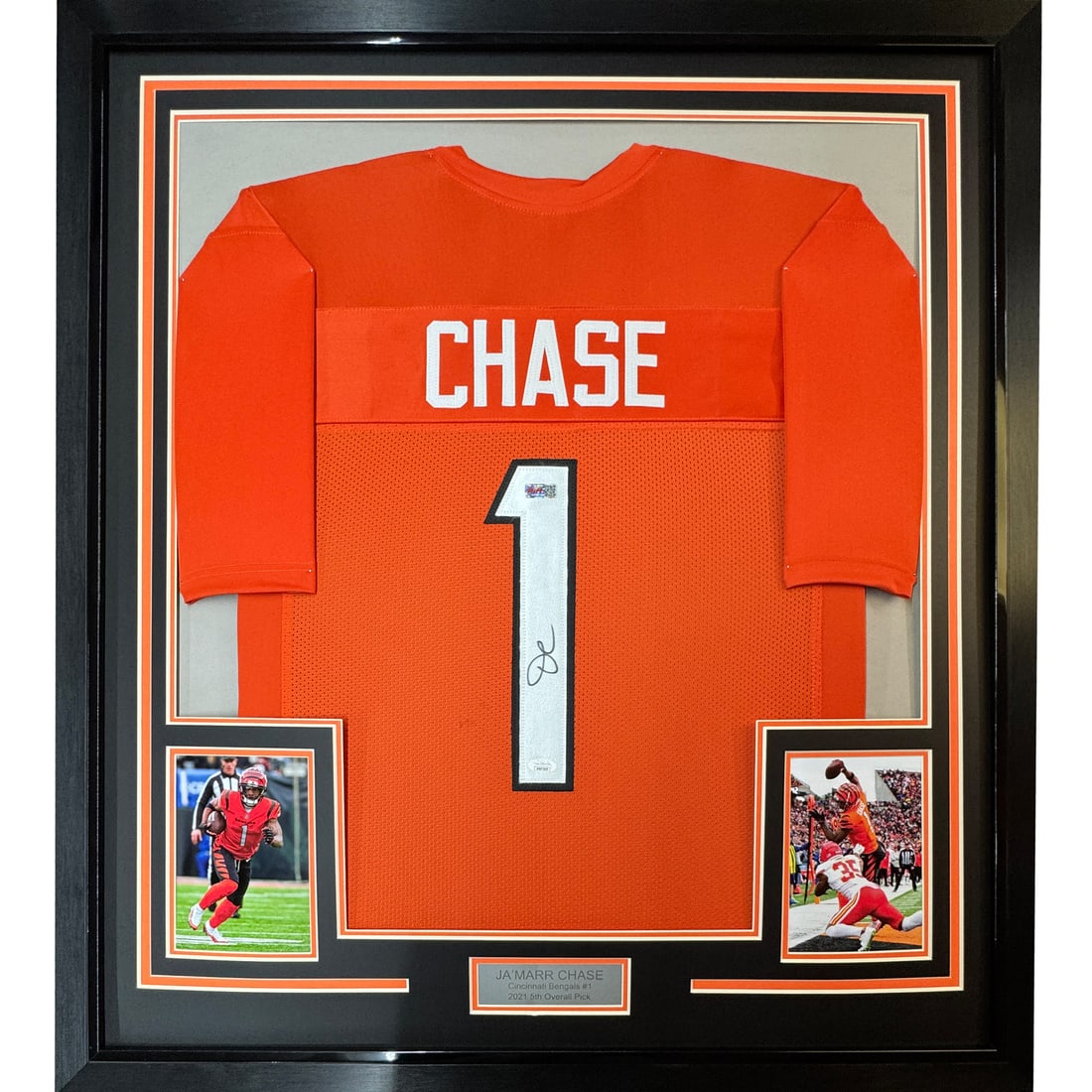 Framed Autographed Ja'Marr Chase Cincinnati Bengals Jersey with BAS COA: Framed Autographed Ja'Marr Chase Cincinnati Bengals Jersey with BAS COA Celebrate your passion for football with this professionally framed and autographed Ja'Marr Chase Cincinnati Bengals jersey. Mea