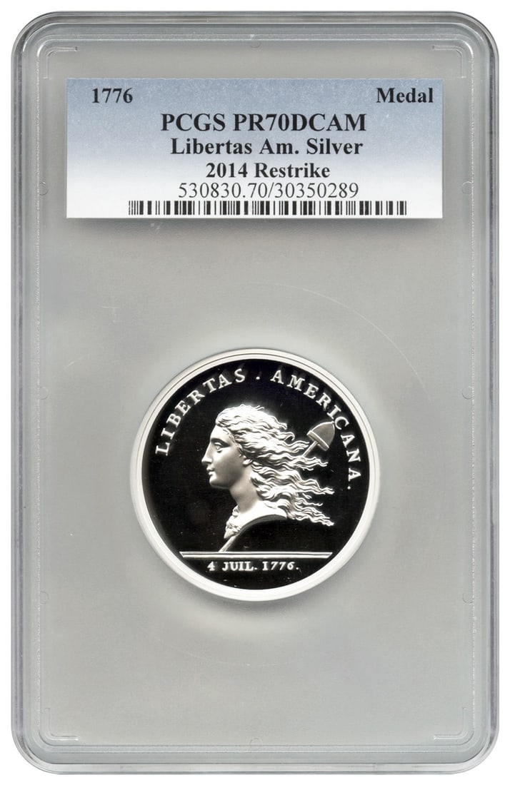 2014 Libertas Americana 5 oz Silver Medal PCGS PR70 DCAM Restrike: 2014 Libertas Americana 5 oz Silver Medal PCGS PR70 DCAM Restrike This is a 2014 restrike of the 1776 Libertas Americana silver medal, graded PCGS Proof 70 Deep Cameo (DCAM). The medal is uncirculated