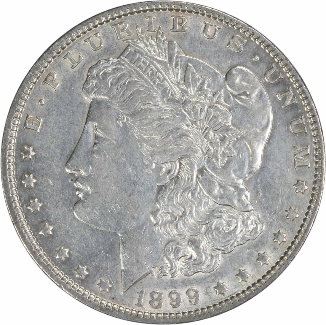 1899 Morgan Silver Dollar AU Uncertified George T Morgan Design: 1899 Morgan Silver Dollar AU Uncertified George T Morgan Design This 1899 Morgan Silver Dollar is an exquisite piece from the Philadelphia Mint, featuring a stunning design by George T. Morgan. It is 