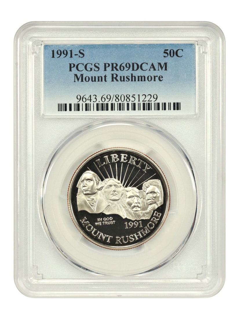 1991 San Francisco Proof Half Dollar Mount Rushmore PCGS PR69DCAM: 1991 San Francisco Proof Half Dollar Mount Rushmore PCGS PR69DCAM This is a 1991-S Mount Rushmore 50-cent commemorative coin, graded PR69 Deep Cameo by PCGS. The coin is uncirculated and features a pr