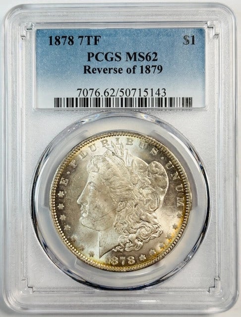 PCGS MS62 1878 Morgan Dollar 7 Tail Feathers Reverse 1879 Silver Coin: PCGS MS62 1878 Morgan Dollar 7 Tail Feathers Reverse 1879 Silver Coin This is an 1878 Morgan Silver Dollar featuring the 7 Tail Feathers, Reverse of 1879 variety. Certified by PCGS with a grade of MS 