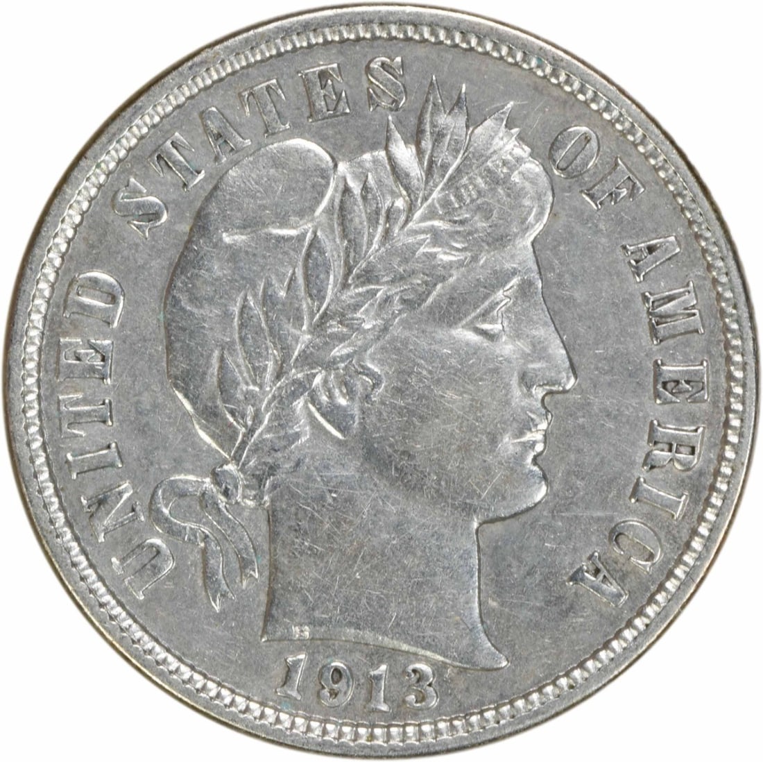 1913 Barber Dime 10C AU Uncertified 90% Silver Coin: 1913 Barber Dime 10C AU Uncertified 90% Silver Coin This 1913 Barber Silver Dime is a notable collectible coin that showcases the artistry of designer Charles E. Barber. Struck in Philadelphia, this c