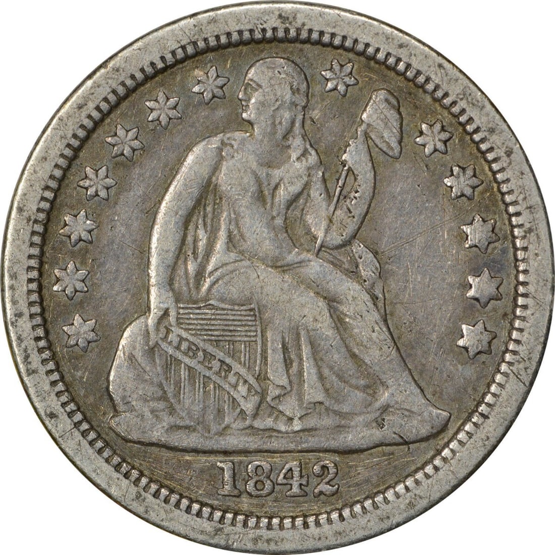 1842-O Liberty Seated Dime 90% Silver XF Uncertified: 1842-O Liberty Seated Dime 90% Silver XF Uncertified This 1842-O Liberty Seated Silver Dime showcases a rich history with its classic design by Christian Gobrecht. Struck at the New Orleans Mint, this
