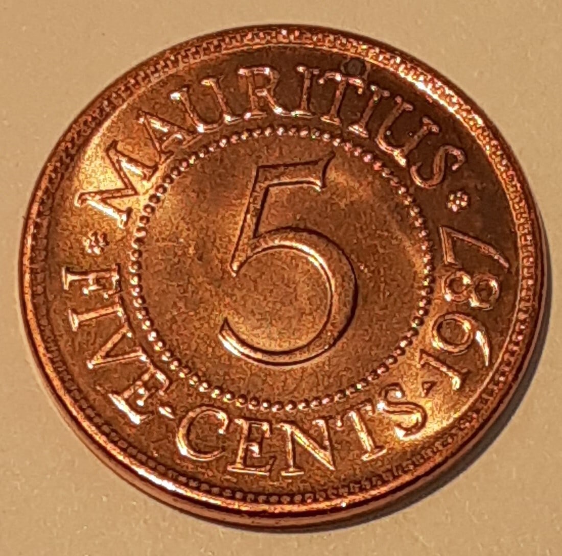 Roll of 30 Mauritius 1987 5 Cents Bronze Coins Featuring Ramgoolam BU: Roll of 30 Mauritius 1987 5 Cents Bronze Coins Featuring Ramgoolam BU This roll contains 30 uncirculated 1987 Mauritius 5 Cents bronze coins. Each coin features a bust of Sir Seewoosagur Ramgoolam on 
