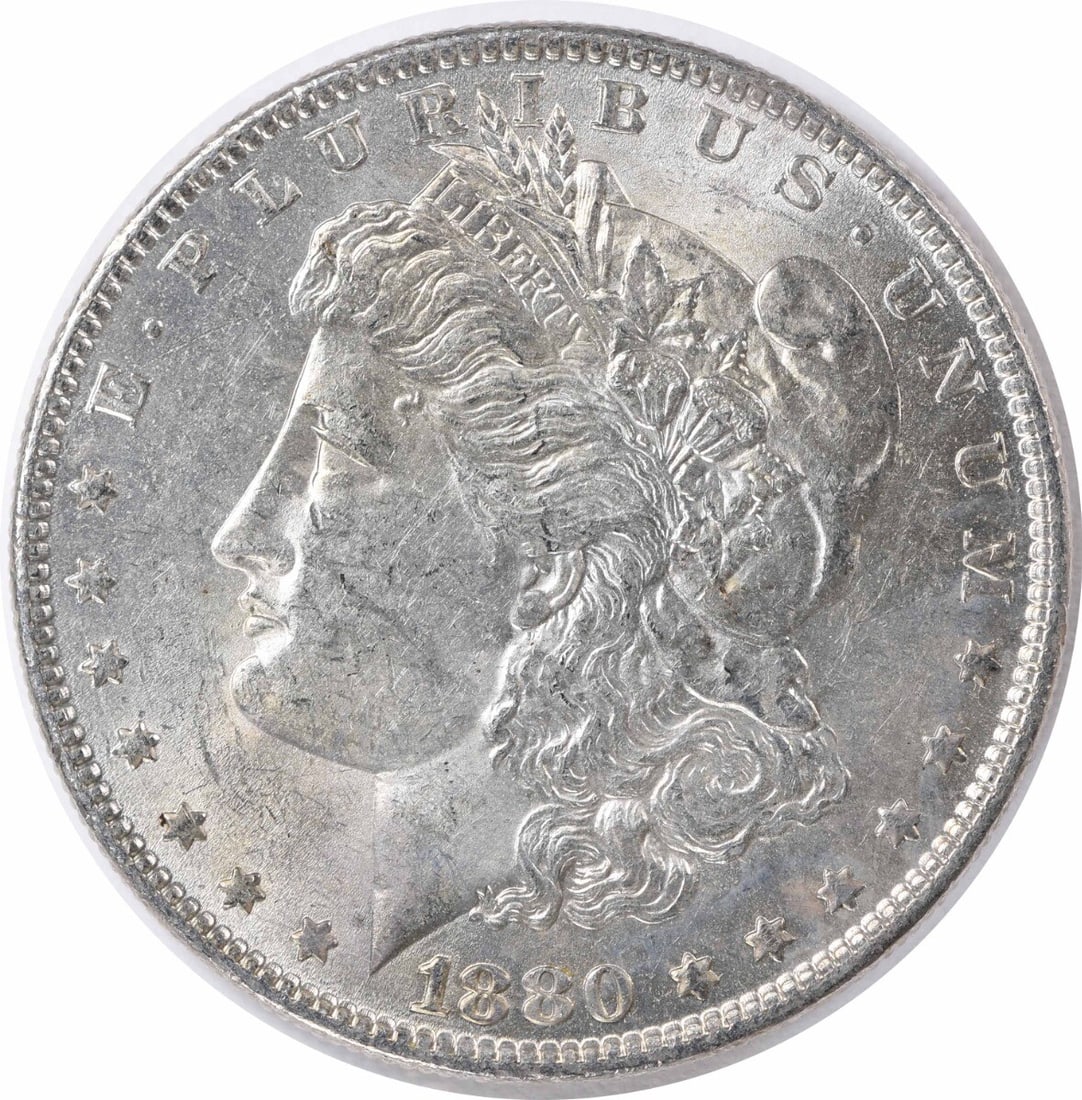 1880-O Morgan Silver Dollar AU Uncertified 90% Silver Coin: 1880-O Morgan Silver Dollar AU Uncertified 90% Silver Coin This 1880-O Morgan Silver Dollar showcases the classic design by George T. Morgan, featuring a beautiful depiction of Liberty on the obverse 