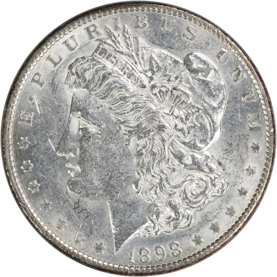 AU 1898 Philadelphia Morgan Dollar 90 Percent Silver Uncertified Coin: AU 1898 Philadelphia Morgan Dollar 90 Percent Silver Uncertified Coin This 1898 Morgan Silver Dollar is a circulated coin from the United States, featuring a composition of 90% silver and 10% copper. 