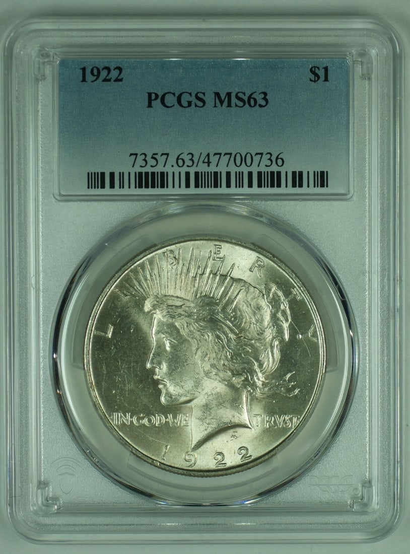 PCGS MS 63 1922 Peace Silver Dollar Uncirculated $1 Coin: PCGS MS 63 1922 Peace Silver Dollar Uncirculated $1 Coin This 1922 Peace Silver $1 Dollar Coin is certified by PCGS with a grade of MS 63, indicating an uncirculated condition. The coin is composed of