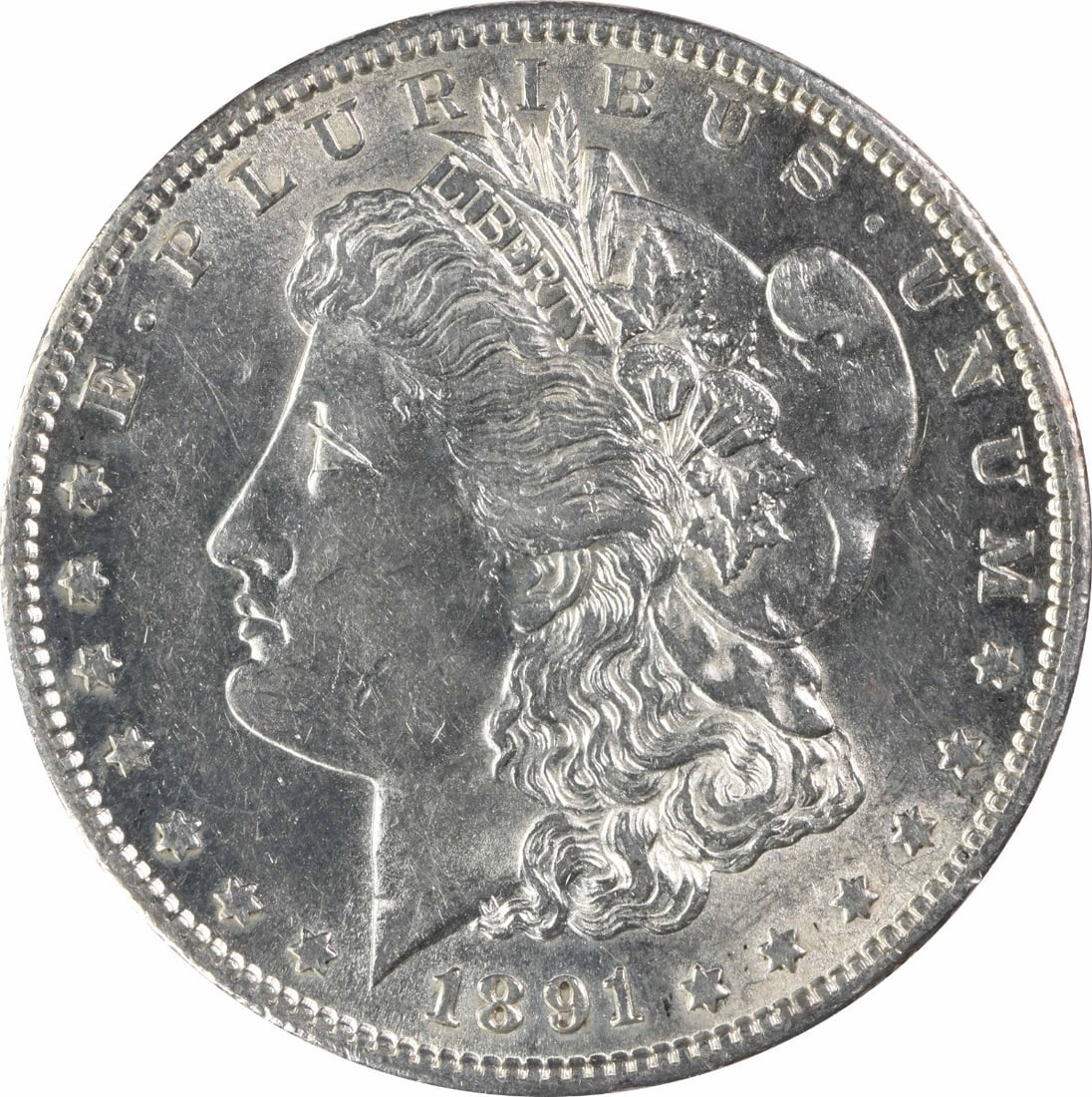 1891 San Francisco Morgan Dollar AU Grade 90 Percent Silver Uncertified: 1891 San Francisco Morgan Dollar AU Grade 90 Percent Silver Uncertified This 1891-S Morgan Silver Dollar is an AU (About Uncirculated) grade coin, struck at the San Francisco Mint. It is composed of 9