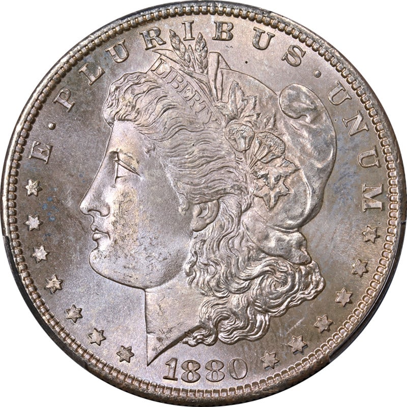 PCGS MS67 San Francisco 1880 Morgan Dollar with Lilac Toning: PCGS MS67 San Francisco 1880 Morgan Dollar with Lilac Toning This stunning 1880-S Morgan Silver Dollar is certified by PCGS with a remarkable MS67 grade, showcasing exceptional eye appeal and a strong