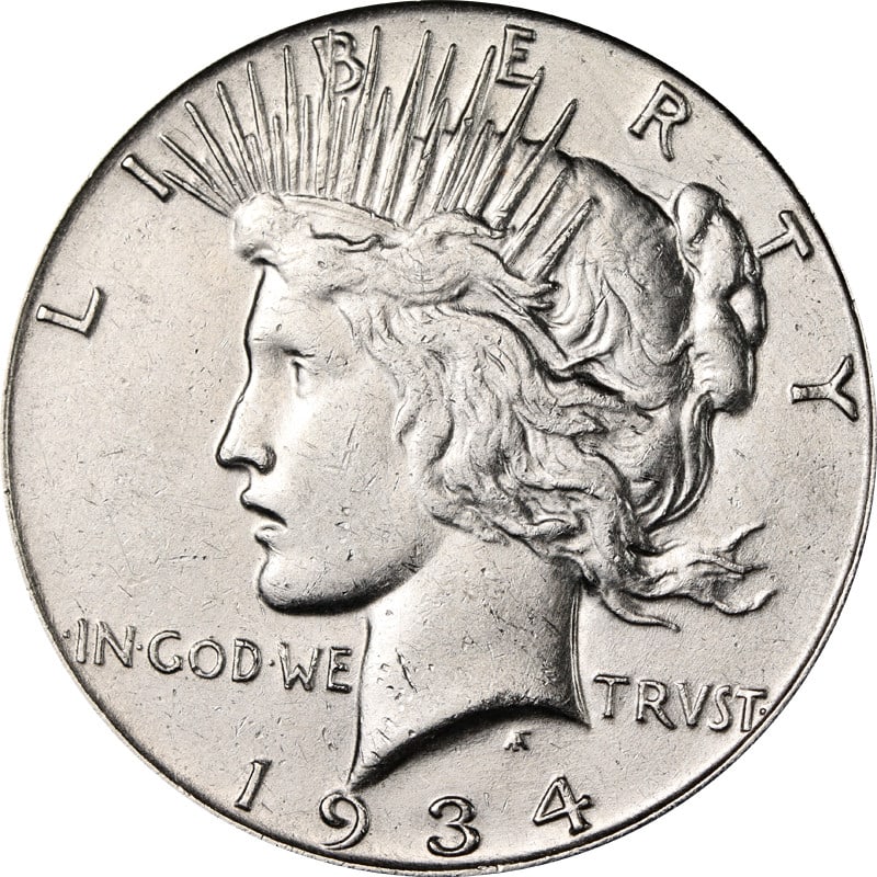 1934 San Francisco Silver Peace Dollar Cleaned Uncertified US Coin: 1934 San Francisco Silver Peace Dollar Cleaned Uncertified US Coin This is a 1934-S Peace Dollar from the United States, composed of silver with a fineness of 0.9. The coin was minted in San Francisco