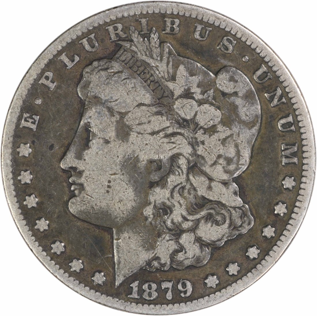 Carson City 1879 Morgan Dollar VG Grade Uncertified Silver Coin: Carson City 1879 Morgan Dollar VG Grade Uncertified Silver Coin This is an 1879-CC Morgan Silver Dollar featuring the classic design by George T. Morgan. Minted in Carson City, this pre-owned coin is 