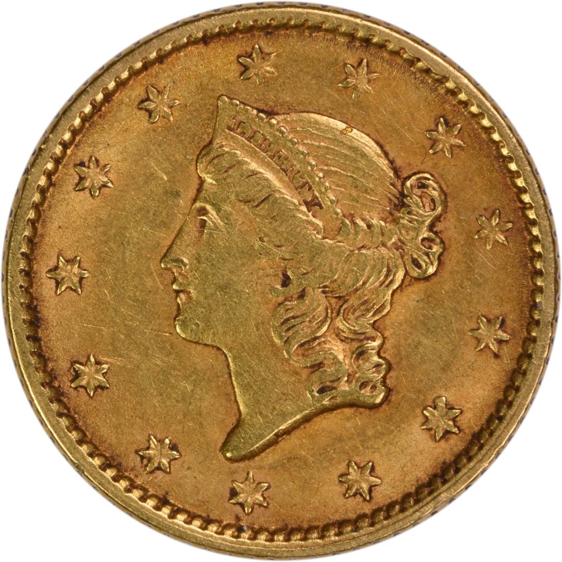 1851 United States Gold Dollar Type 1 AU Grade Uncertified Coin: 1851 United States Gold Dollar Type 1 AU Grade Uncertified Coin This 1851 $1 Gold Type 1 coin was minted in Philadelphia and designed by James Barton Longacre. It is composed of 90% gold and 10% coppe