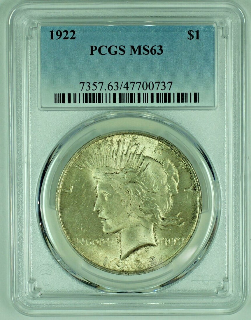 PCGS MS 63 Plus 1922 Peace Silver Dollar Toned Uncirculated Coin: PCGS MS 63 Plus 1922 Peace Silver Dollar Toned Uncirculated Coin This is a 1922 Peace Silver $1 Dollar Coin from the United States. The coin is uncirculated with a toned appearance and has been graded