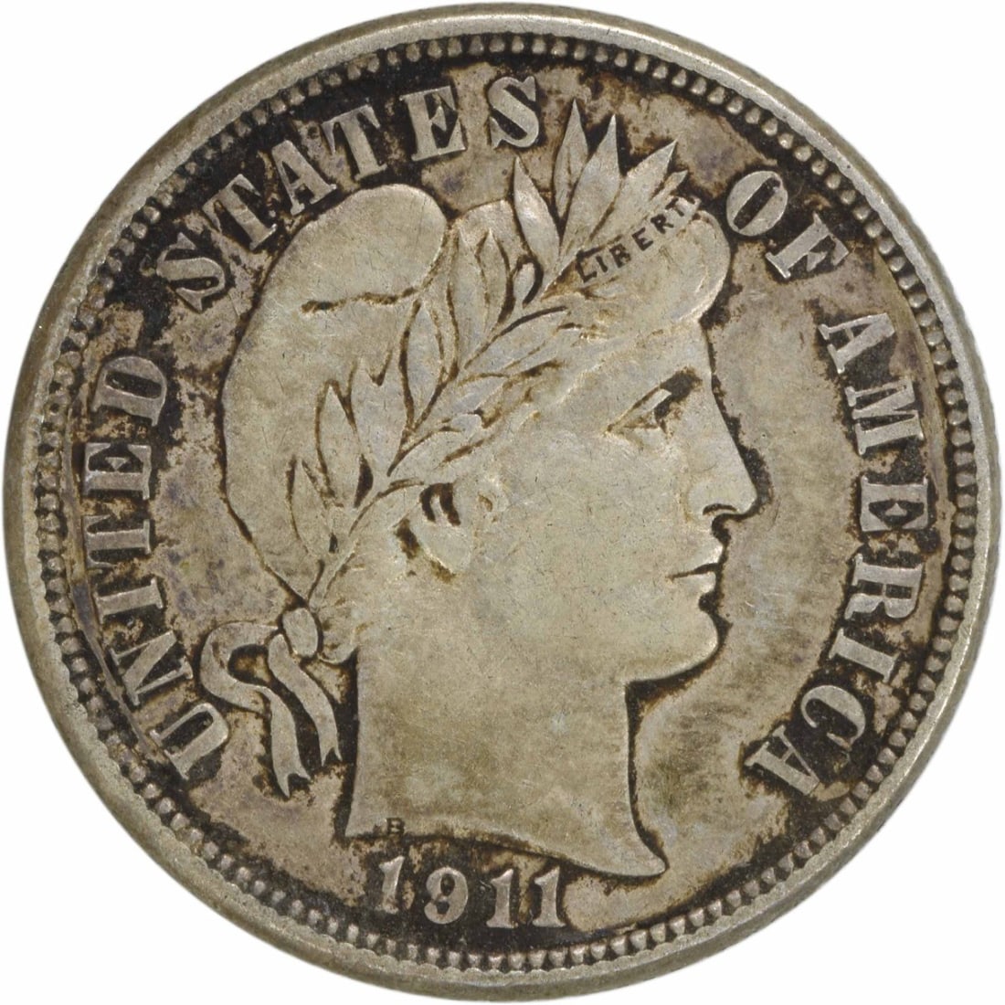 1911-D Barber Dime AU Uncertified 90% Silver Coin: 1911-D Barber Dime AU Uncertified 90% Silver Coin This 1911-D Barber Silver Dime is a remarkable piece of American numismatic history. Minted in Denver, this coin features the iconic Barber design by 