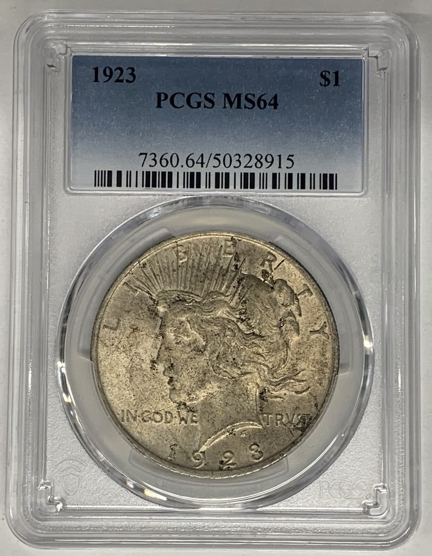 1923 Peace Dollar PCGS MS 64 Uncirculated Silver Coin Toned: 1923 Peace Dollar PCGS MS 64 Uncirculated Silver Coin Toned This 1923 Peace Silver Dollar coin is an uncirculated example featuring a natural toned finish. Graded MS 64 by PCGS, it is composed of silv