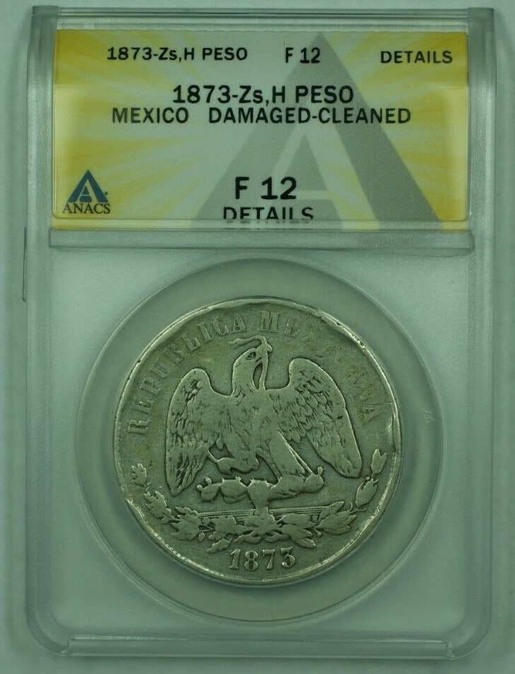 Mexico 1873-Zs H 1 Peso Silver Coin ANACS F-12 Cleaned Damaged: Mexico 1873-Zs H 1 Peso Silver Coin ANACS F-12 Cleaned Damaged This 1873-Zs, H 1 Peso coin from Mexico dates to the Second Republic period (1867-1905) and is composed of 0.903 fine silver. The coin ha
