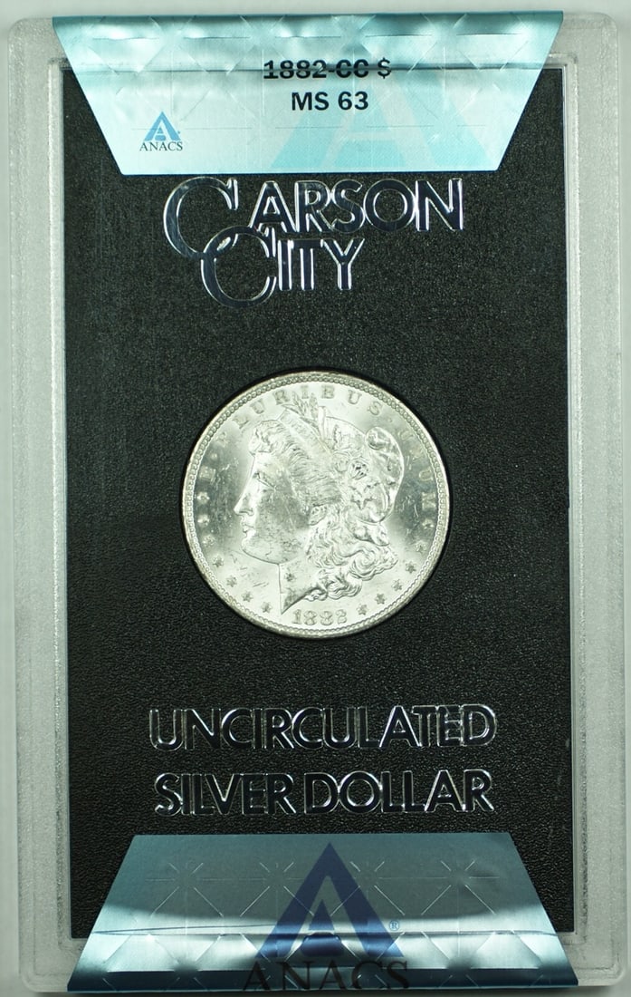 1882-CC Morgan Silver Dollar GSA Holder ANACS MS 63 Carson City Mint: 1882-CC Morgan Silver Dollar GSA Holder ANACS MS 63 Carson City Mint This 1882-CC Morgan Silver Dollar features the iconic design minted in Carson City. Graded MS 63 by ANACS, this uncirculated coin i