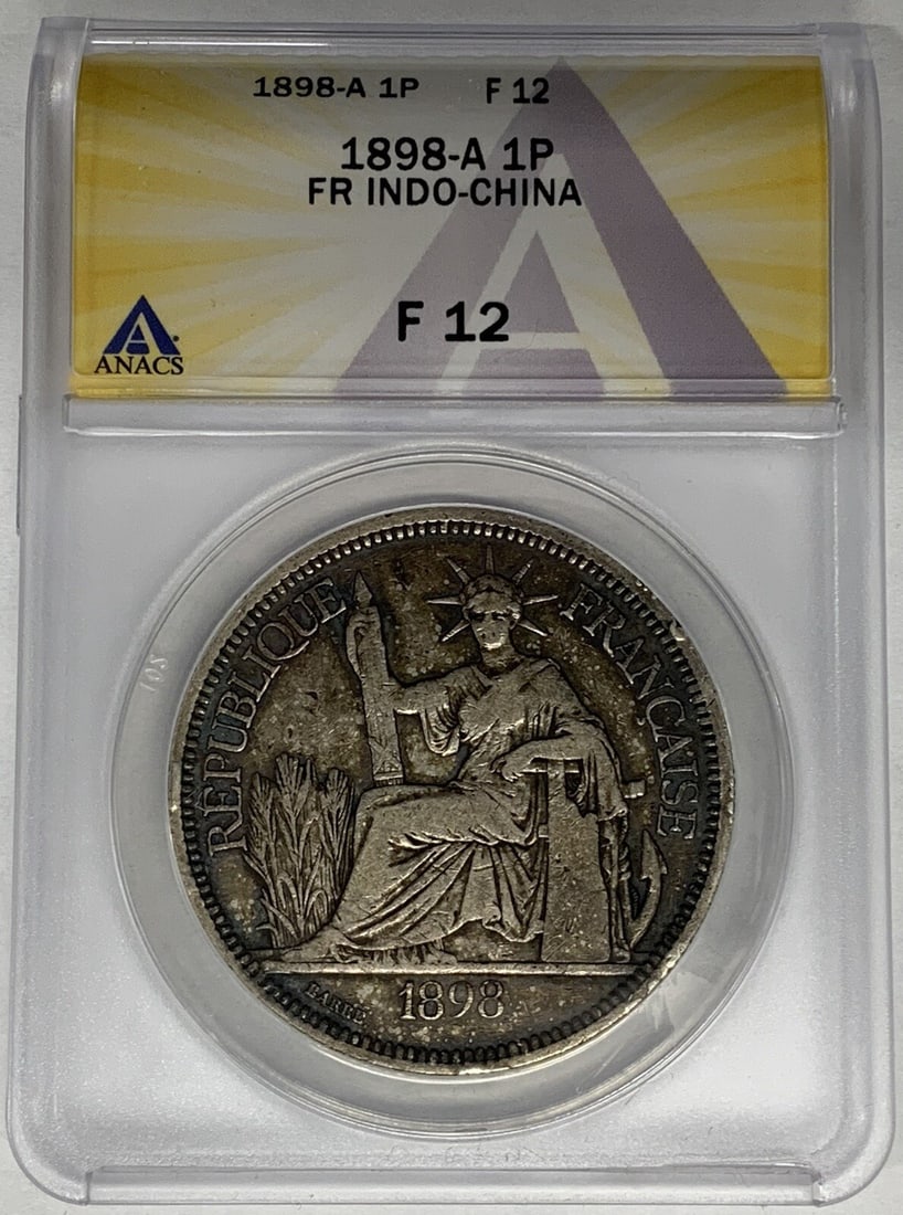 1898-A Silver 1 Piastre Coin ANACS F12 from French India-China: 1898-A Silver 1 Piastre Coin ANACS F12 from French India-China This 1898-A 1 Piastre silver coin from French Indochina is certified by ANACS with a grade of F 12. Issued during the Empire period, this