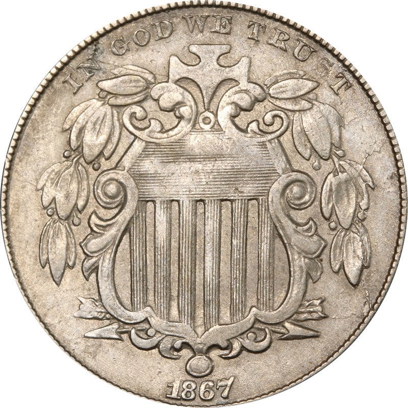 Nickel Five Cent Coin United States 1867 Shield Design Circulated: Nickel Five Cent Coin United States 1867 Shield Design Circulated This 1867 Shield Nickel is a circulated coin from the United States, composed of nickel. It is uncertified and is in pre-owned conditi
