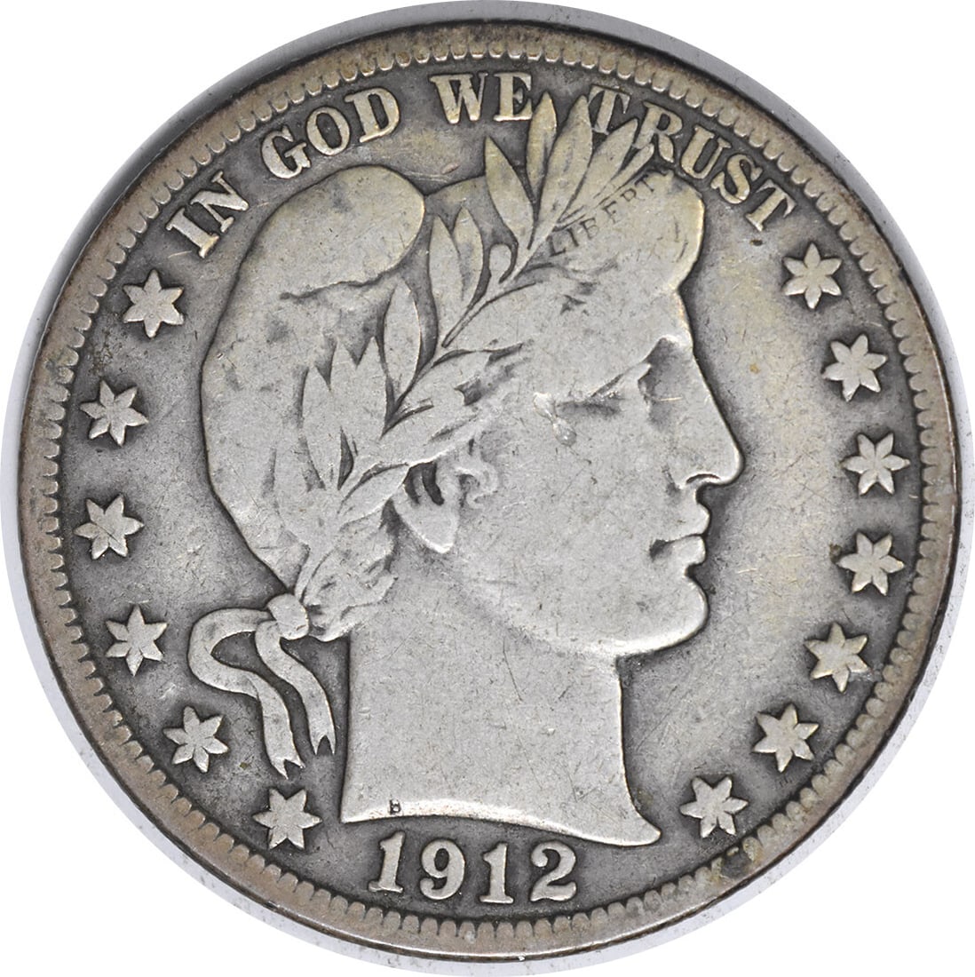 1912-S Barber Half Dollar 50C Silver Coin VF Uncertified: 1912-S Barber Half Dollar 50C Silver Coin VF Uncertified This 1912-S Barber Silver Half Dollar is a remarkable piece of numismatic history, featuring a design by Charles E. Barber. Minted in San Franc