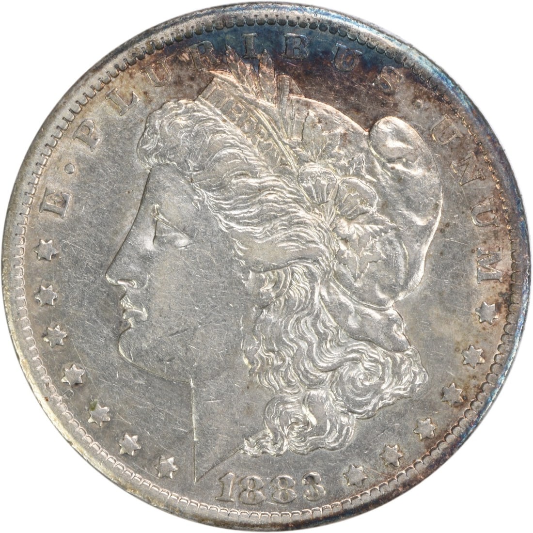1883-CC Morgan Silver Dollar AU Uncertified 90% Silver Coin: 1883-CC Morgan Silver Dollar AU Uncertified 90% Silver Coin This 1883-CC Morgan Silver Dollar is an attractive piece for collectors, showcasing the artistry of designer George T. Morgan. The coin is i