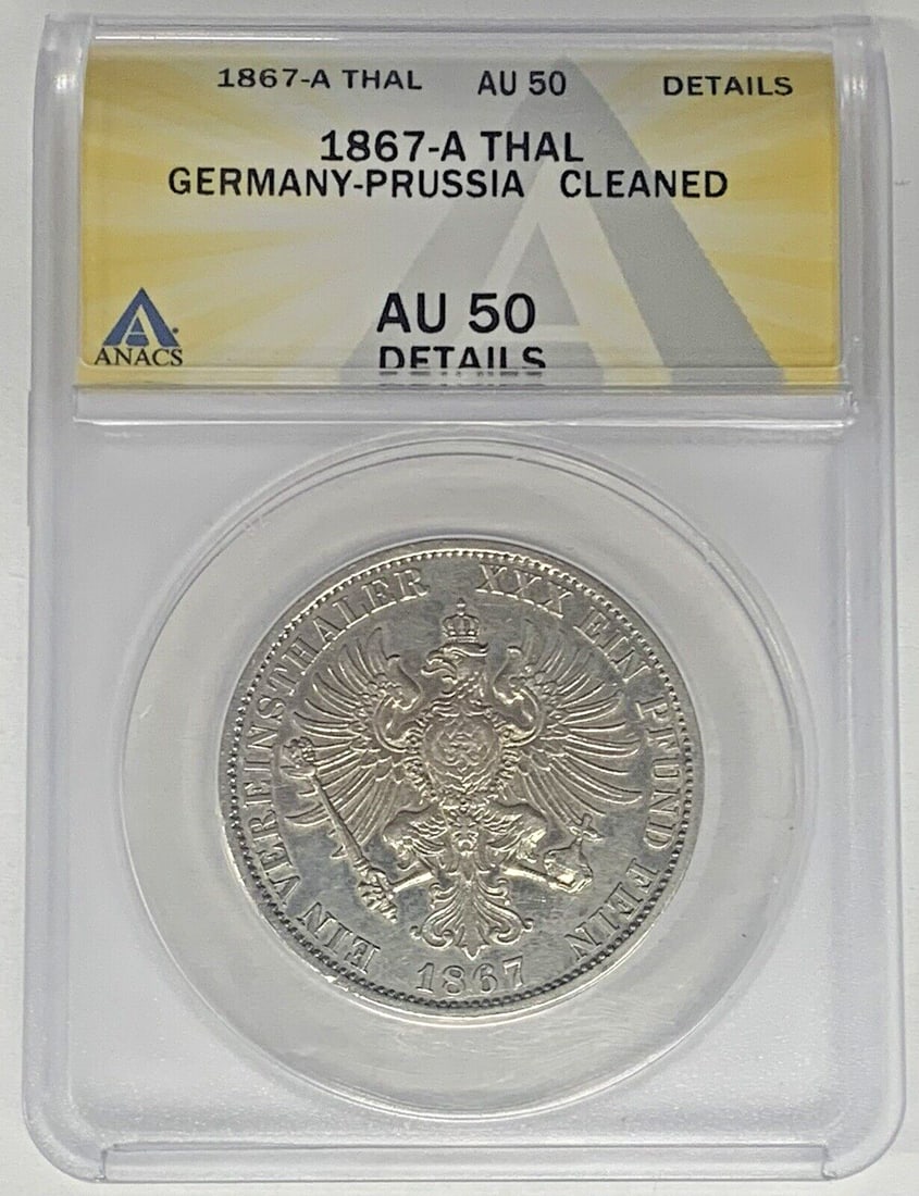 German States 1867-A Thaler Coin ANACS AU 50 Certified: German States 1867-A Thaler Coin ANACS AU 50 Certified This 1867-A Germany Thaler is from the German States period and is graded AU 50 by ANACS. The coin has been cleaned and is in pre-owned condition