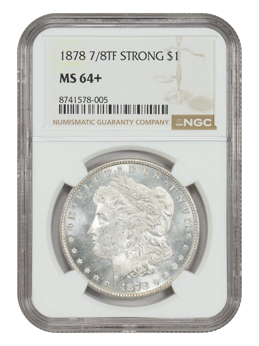 NGC MS64 Plus 1878 7 Over 8 Tailfeathers Morgan Silver Dollar Variety: NGC MS64 Plus 1878 7 Over 8 Tailfeathers Morgan Silver Dollar Variety This 1878 7/8 Tailfeathers Morgan Dollar is a desirable variety, graded MS64+ (Strong) by NGC. Struck in Philadelphia, it features