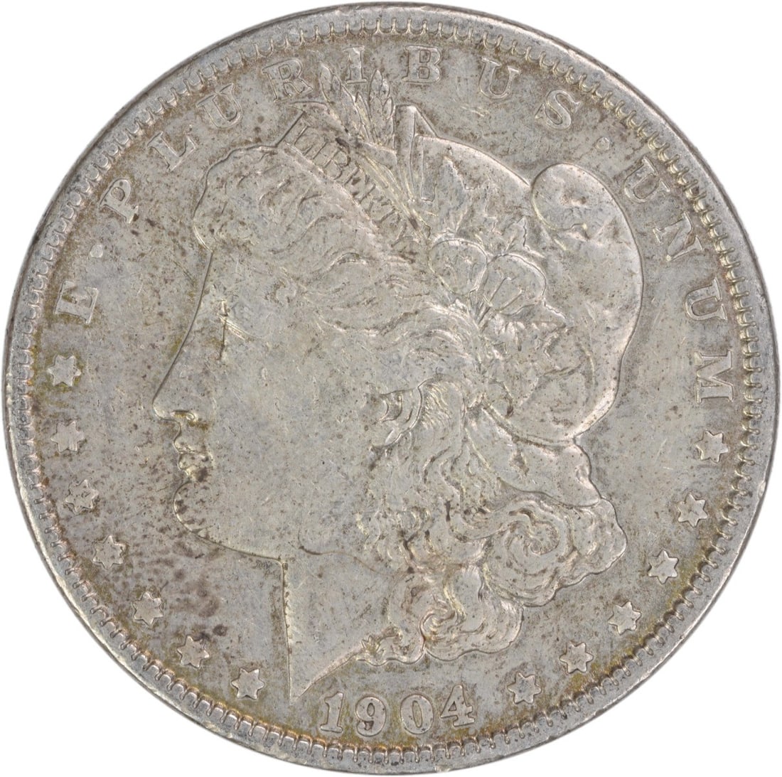 1904 Morgan Dollar 90 Percent Silver Philadelphia VF Uncertified Coin: 1904 Morgan Dollar 90 Percent Silver Philadelphia VF Uncertified Coin This 1904 Morgan Silver Dollar is a circulated coin from the United States, featuring a composition of 90% silver and 10% copper. 