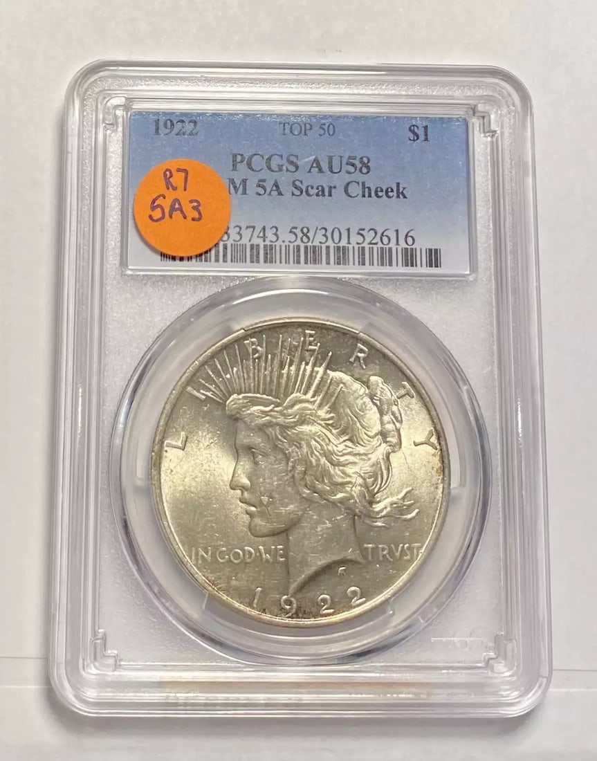 1922 Peace Silver Dollar PCGS AU58 VAM 5A Philadelphia Mint: 1922 Peace Silver Dollar PCGS AU58 VAM 5A Philadelphia Mint This 1922 Peace Silver Dollar is a stunning piece certified by PCGS with an AU-58 grade, indicating it is in excellent circulated condition.